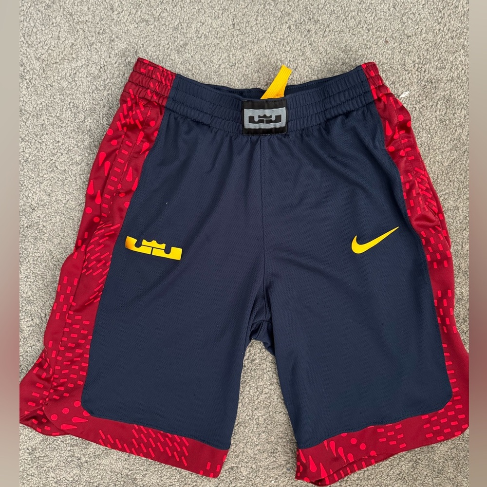 Nike dry fit boy shorts, size large color navy blue, and red